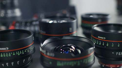 electronics selective focus photography of Canon lenses cup